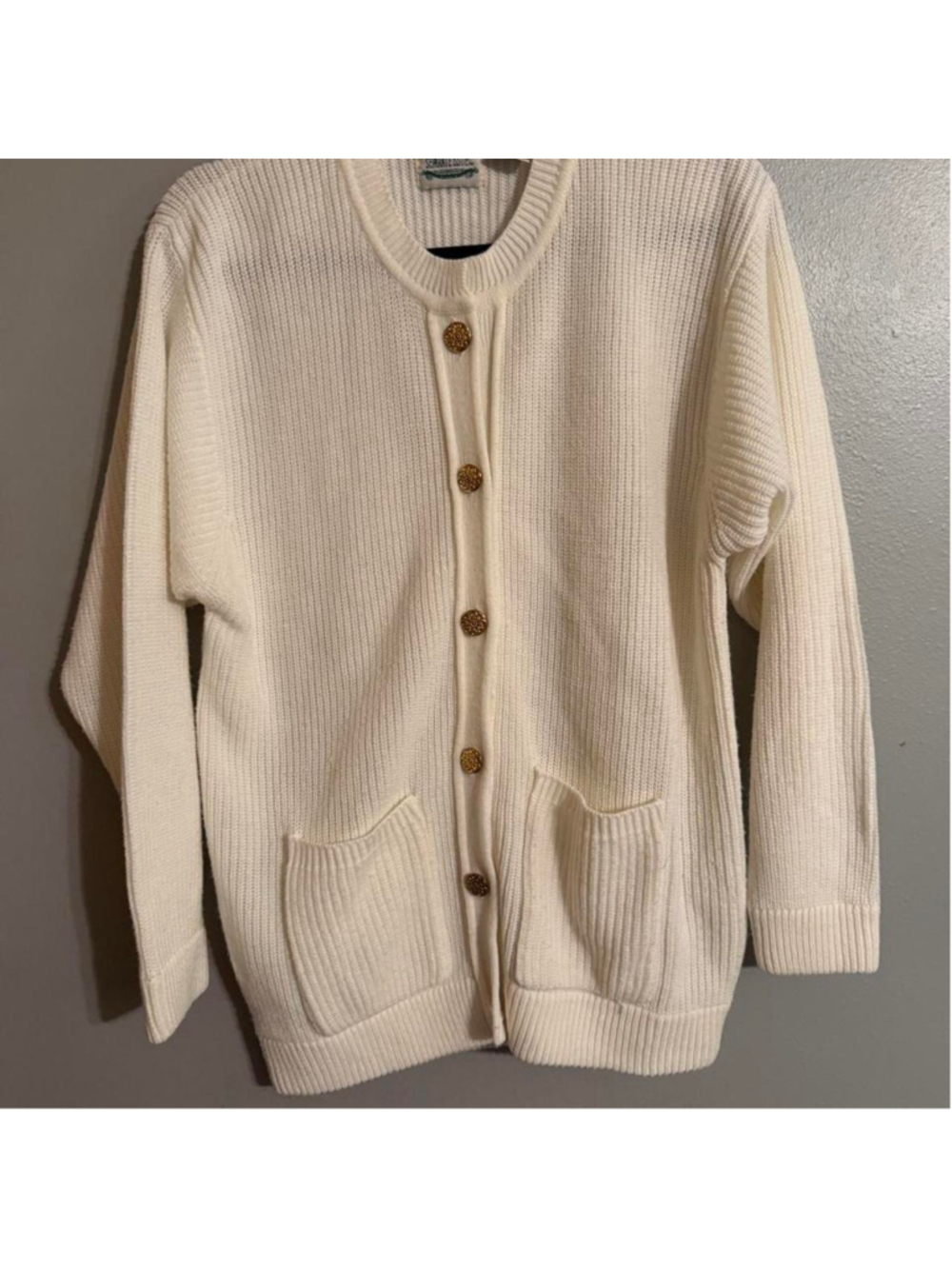 Vintage cream chunky knit cardigan with ornate gold floral buttons, oversized pa